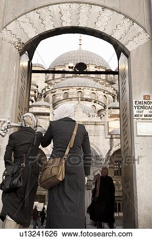 Two women entering Yeni Camii Mosque, Istanbul, Turkey View Large Photo Image Stock Photograph - Two women entering Yeni Camii Mosque, Istanbul, Turkey. Fotosearch