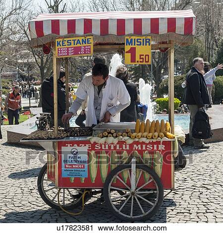 Stock Image - Vendor selling corn and Kestane kebabs on a cart, Istanbul, Turkey. Fotosearch