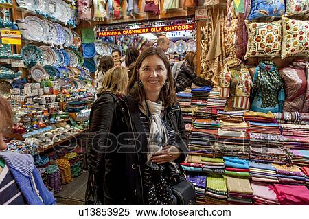 Stock Photography - Woman shopping at Grand Bazaar, Istanbul, Turkey. Fotosearch