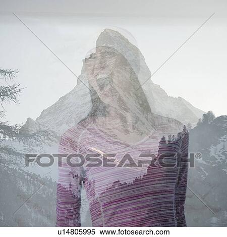 Stock Photography - Woman's picture superimposed over the Mt Matterhorn, Zermatt, Valais Canton, Switzerland. Fotosearch