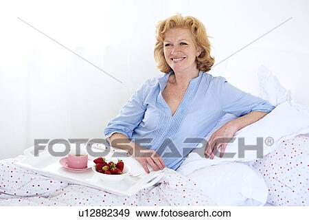Stock Photo - Breakfast in bed. Fotosearch