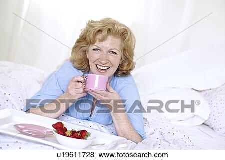 Breakfast in bed View Large Photo Image Stock Photo - Breakfast in bed. Fotosearch