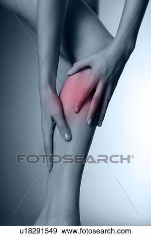 Stock Photo - Calf pain. Fotosearch