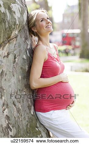 Happy pregnant woman View Large Photo Image Picture - Happy pregnant woman. Fotosearch