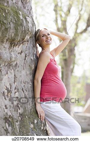 Happy pregnant woman View Large Photo Image Stock Photo - Happy pregnant woman. Fotosearch