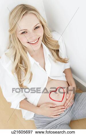 Happy pregnant woman View Large Photo Image Stock Photo - Happy pregnant woman. Fotosearch