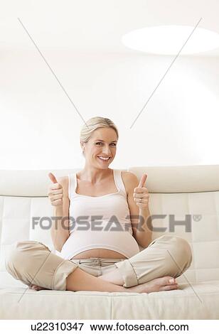 Happy pregnant woman View Large Photo Image Stock Photo - Happy pregnant woman. Fotosearch