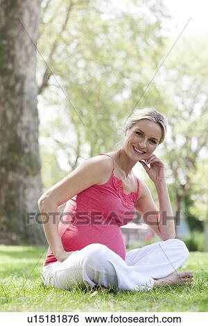 Stock Photograph - Happy pregnant woman. Fotosearch