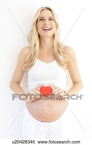 Stock Photography - Happy pregnant woman. Fotosearch