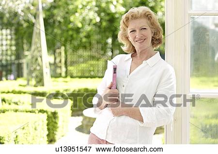 Stock Photo - Happy woman. Fotosearch