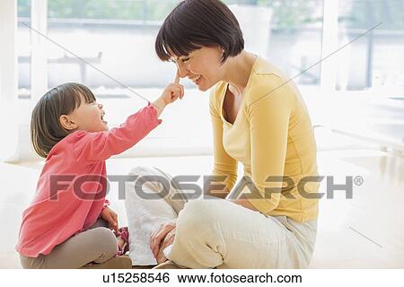 Mother and daughter View Large Photo Image Stock Photograph - Mother and daughter. Fotosearch