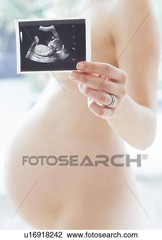 Pregnant woman and baby scan View Large Photo Image Stock Image - Pregnant woman and baby scan. Fotosearch