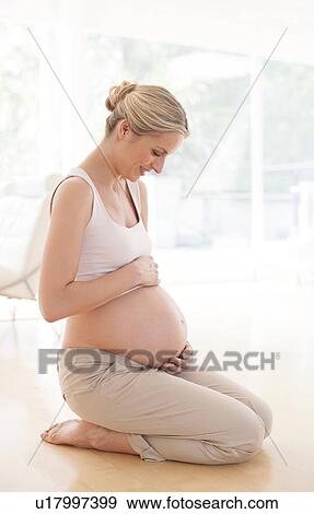 Stock Photo - Pregnant woman. Fotosearch