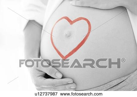 Pregnant woman's abdomen View Large Photo Image Stock Photo - Pregnant woman's abdomen. Fotosearch