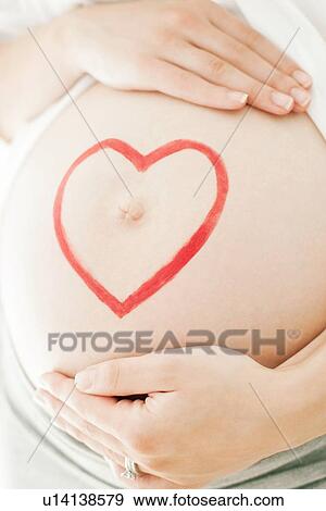 Pregnant woman's abdomen View Large Photo Image Stock Photo - Pregnant woman's abdomen. Fotosearch