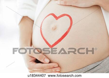 Pregnant woman's abdomen View Large Photo Image Stock Photo - Pregnant woman's abdomen. Fotosearch