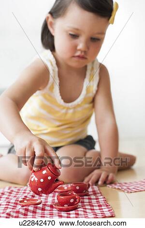Toddler playing View Large Photo Image Stock Image - Toddler playing. Fotosearch