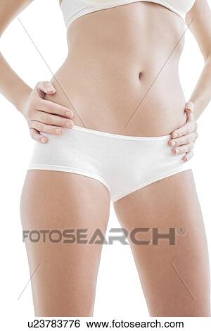 Stock Photograph - Woman's abdomen. Fotosearch