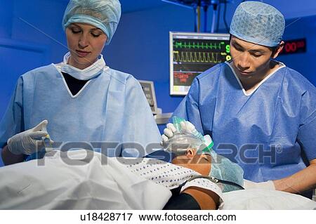 Administering anaesthetic View Large Photo Image Stock Photo - Administering anaesthetic. Fotosearch