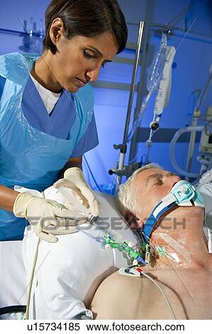 Administering drugs View Large Photo Image Stock Photography - Administering drugs. Fotosearch