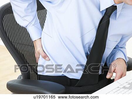 Back pain View Large Photo Image Stock Photography - Back pain. Fotosearch