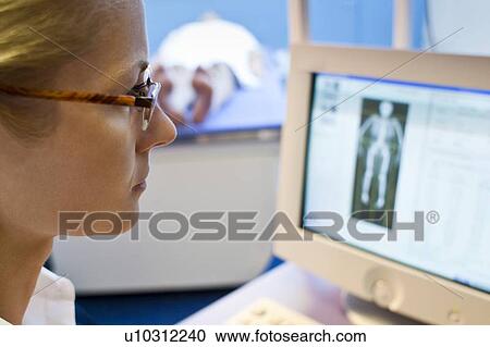 Stock Image - Bone density scan. Fotosearch