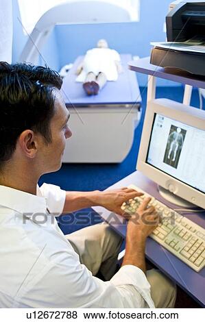 Bone density scan View Large Photo Image Stock Photo - Bone density scan. Fotosearch