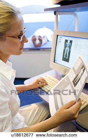 Bone density scan View Large Photo Image Stock Photo - Bone density scan. Fotosearch