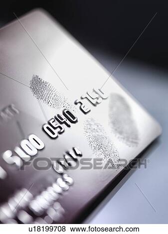 Stock Photo - Credit card fraud, conceptual image. Fotosearch
