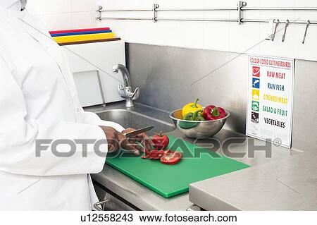 Cutting tomatoes View Large Photo Image Stock Image - Cutting tomatoes. Fotosearch