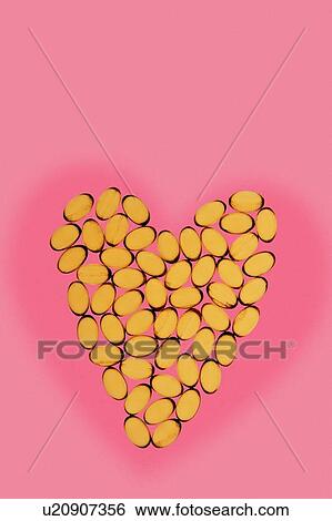 Stock Photograph - Heart supplements, conceptual image. Fotosearch