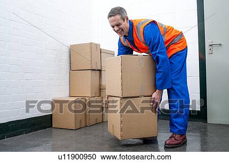 Stock Image - Incorrect lifting posture. Fotosearch