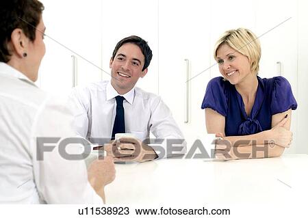 Stock Image - Office meeting. Fotosearch