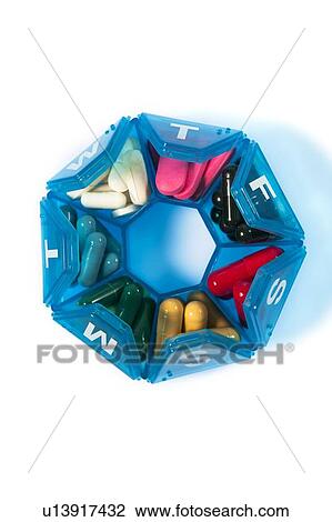 Pills in a pill box View Large Photo Image Stock Image - Pills in a pill box. Fotosearch