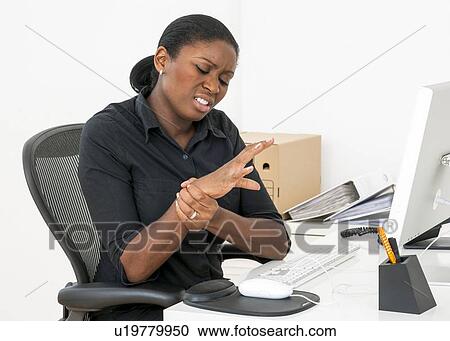 Stock Image - Repetitive strain injury. Fotosearch