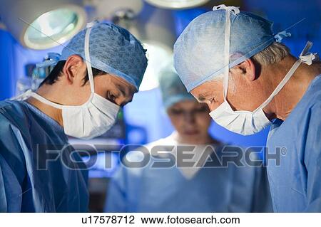 Stock Image - Surgical team. Fotosearch