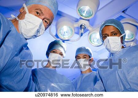 Surgical team View Large Photo Image Stock Photograph - Surgical team. Fotosearch