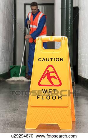 Wet floor sign View Large Photo Image Stock Image - Wet floor sign. Fotosearch