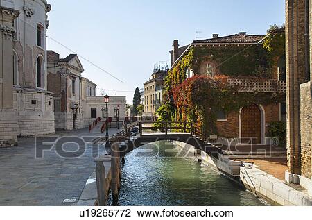 Bridge over urban canal View Large Photo Image Stock Image - Bridge over urban canal. Fotosearch