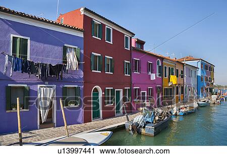 Buildings on urban canal View Large Photo Image Stock Image - Buildings on urban canal. Fotosearch