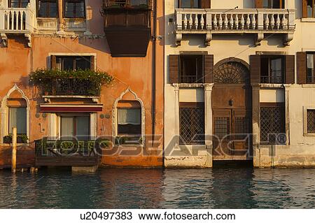 Buildings on urban canal View Large Photo Image Stock Image - Buildings on urban canal. Fotosearch