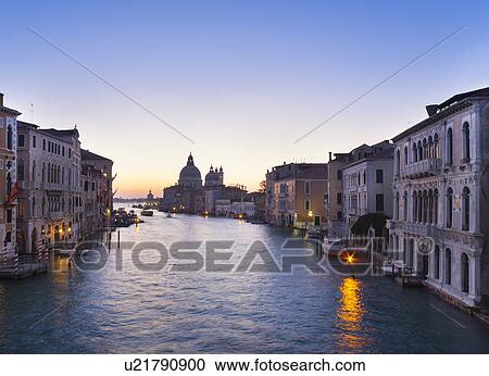Stock Image - Buildings on urban canal. Fotosearch