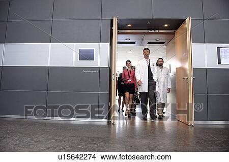 Business people and doctors in office View Large Photo Image Picture - Business people and doctors in office. Fotosearch