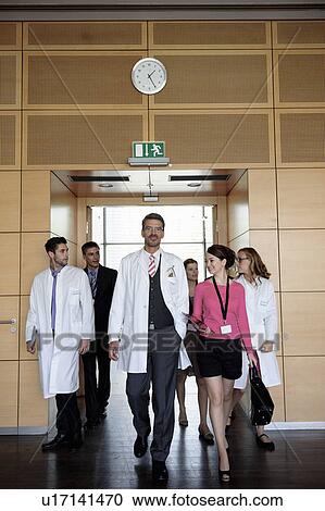 Business people and doctors in office View Large Photo Image Stock Image - Business people and doctors in office. Fotosearch