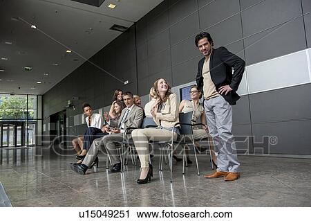 Business people playing musical chairs View Large Photo Image Stock Image - Business people playing musical chairs. Fotosearch