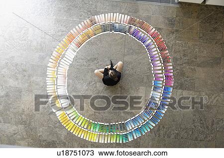 Businesswoman examining paint swatches View Large Photo Image Stock Image - Businesswoman examining paint swatches. Fotosearch