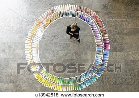 Businesswoman examining paint swatches View Large Photo Image Stock Photo - Businesswoman examining paint swatches. Fotosearch