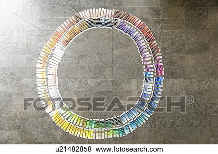 Stock Photo - Circle of paint swatches on floor. Fotosearch