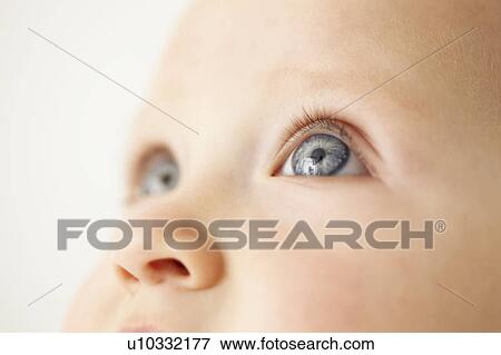 Close up of baby girls eyes View Large Photo Image Stock Photo - Close up of baby girls eyes. Fotosearch