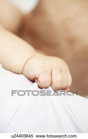 Close up of baby girls fist View Large Photo Image Stock Photography - Close up of baby girls fist. Fotosearch
